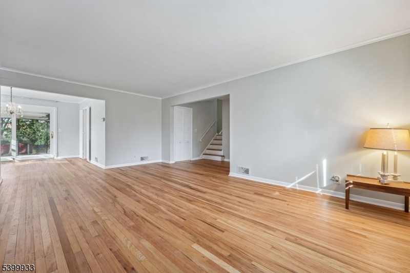 35 South Derby Road Springfield, NJ 07081 - Photo 9 of 30 a bedroom with a bed and a lamp on table