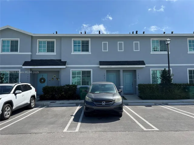 a car parked in front of a house