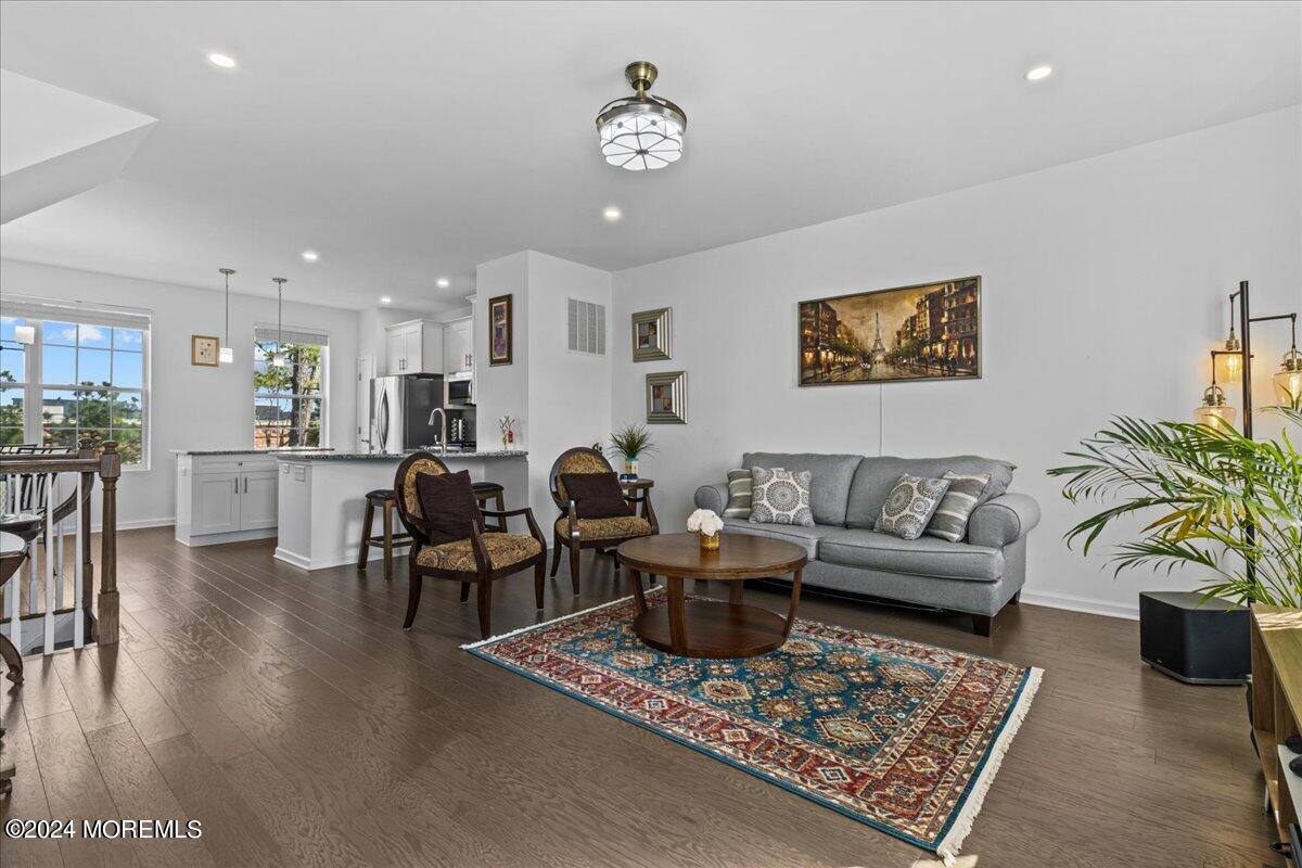 104 Prestige Road Brick, NJ 08723 - Photo 11 of 43 a living room with furniture and a table