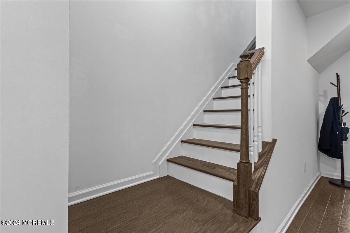 104 Prestige Road Brick, NJ 08723 - Photo 15 of 43 a view of entryway with wooden floor and stairs