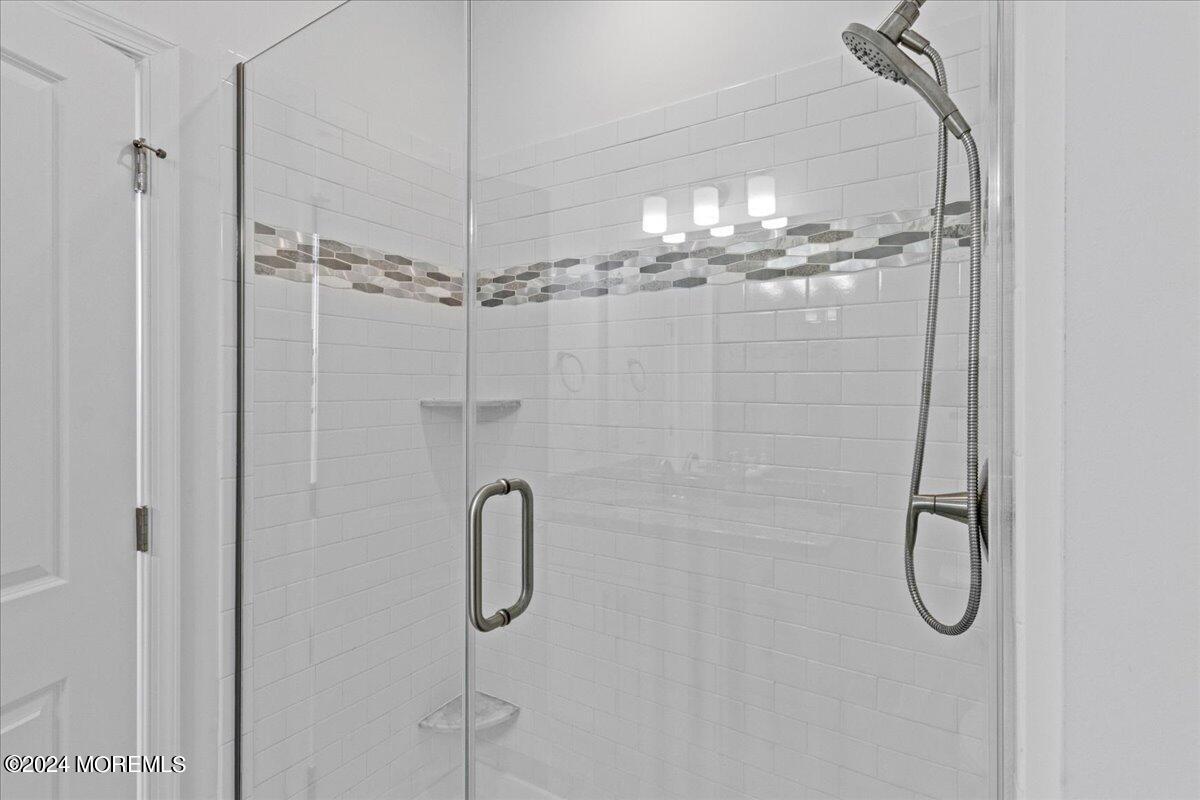 104 Prestige Road Brick, NJ 08723 - Photo 25 of 43 a bathroom with a shower