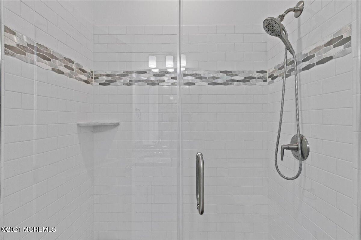 104 Prestige Road Brick, NJ 08723 - Photo 26 of 43 a bathroom with a shower