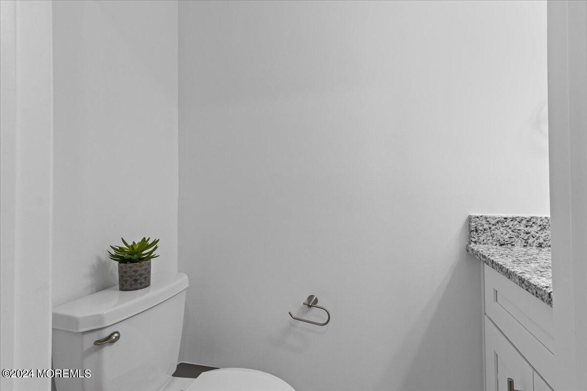 104 Prestige Road Brick, NJ 08723 - Photo 33 of 43 a bathroom with a shower curtain