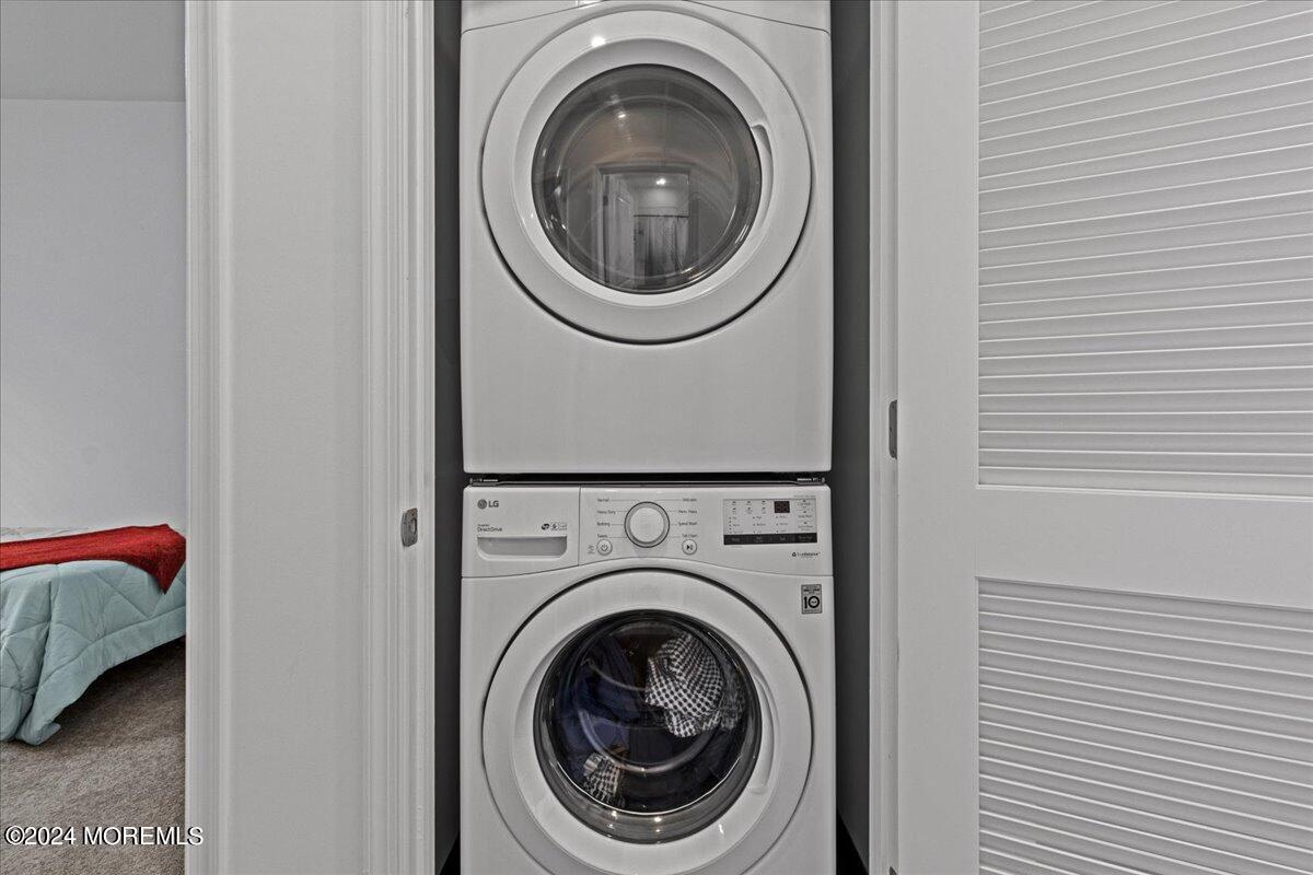 104 Prestige Road Brick, NJ 08723 - Photo 35 of 43 a utility room with dryer and washer