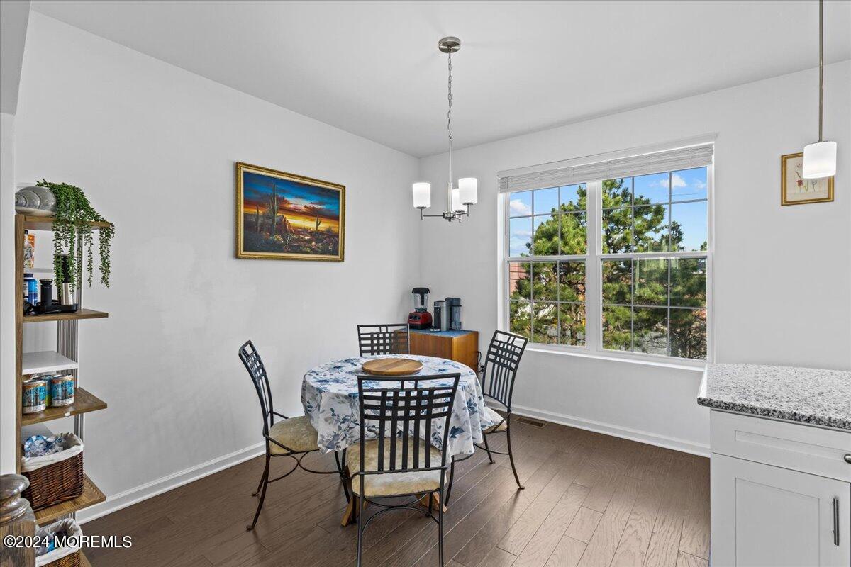 104 Prestige Road Brick, NJ 08723 - Photo 9 of 43 a dining room with furniture and window