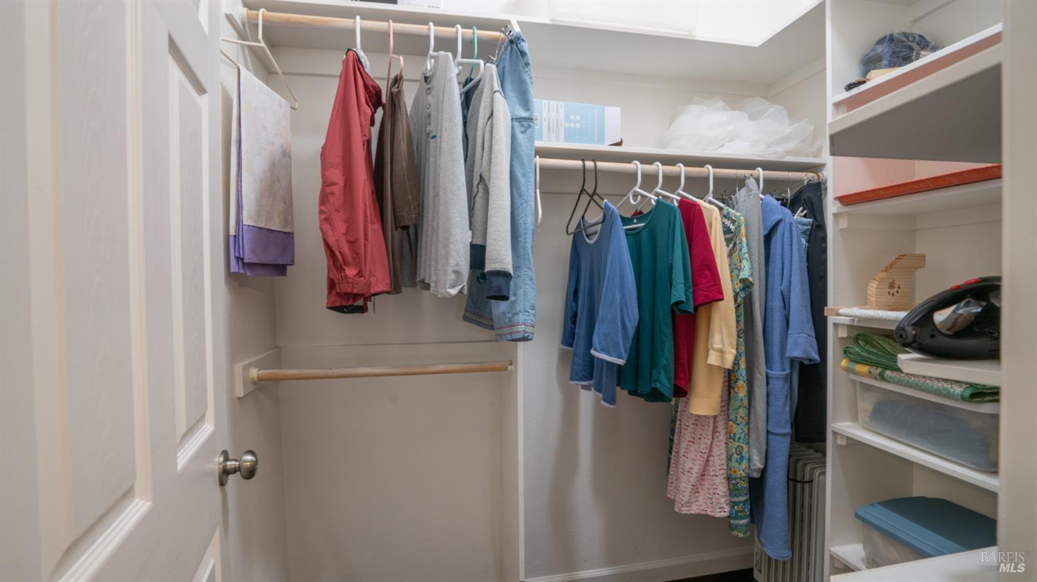 15246 Rio Nido Road Guerneville, CA 95446 - Photo 13 of 24 a view of walk in closet with clothes
