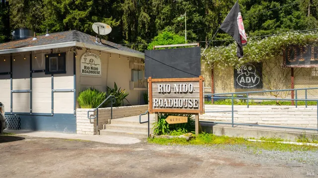a view of lake background with mountain in background