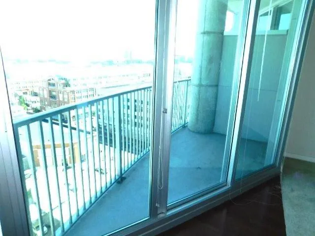 a view of a balcony with city view