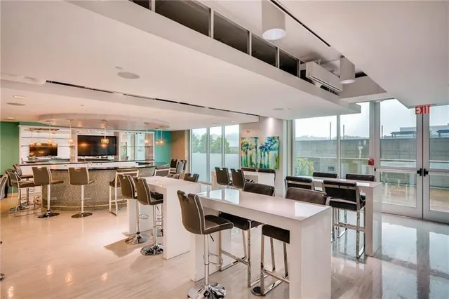 a view of a swimming pool with a lounge chairs