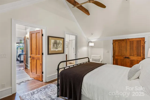 a bedroom with a bed and a cabinets