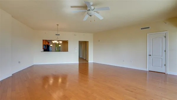 a kitchen with a refrigerator and a stove