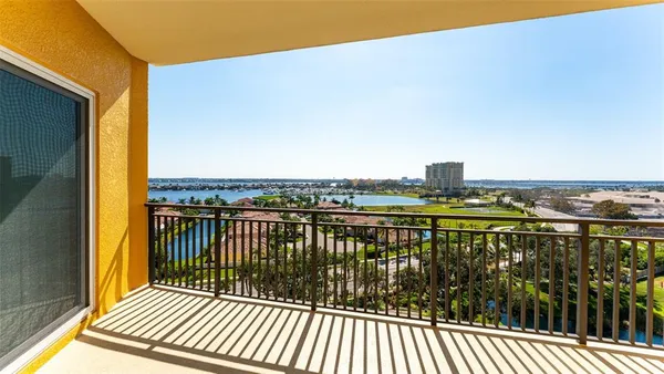 a view of a balcony with city