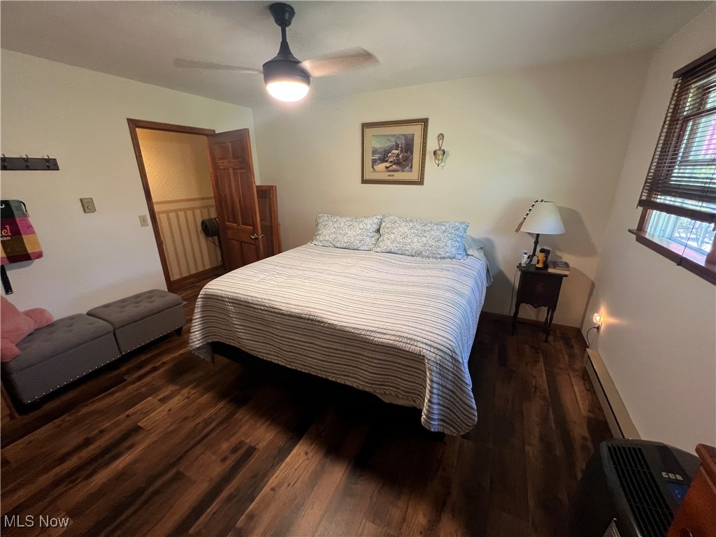 86422 North Bay Road Scio, OH 43988 - Photo 12 of 47 Bedroom with multiple windows, ceiling fan, and dark hardwood / wood-style flooring