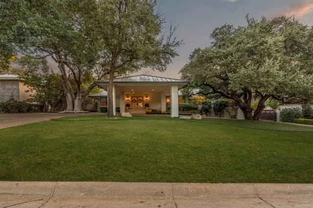 a view of house with outdoor space