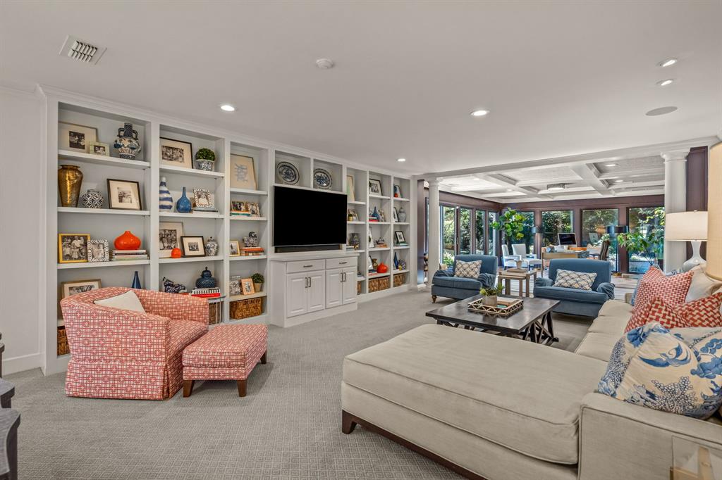 5849 Merrymount Road Westover Hills, TX 76107 - Photo 12 of 40 a living room with furniture and a flat screen tv