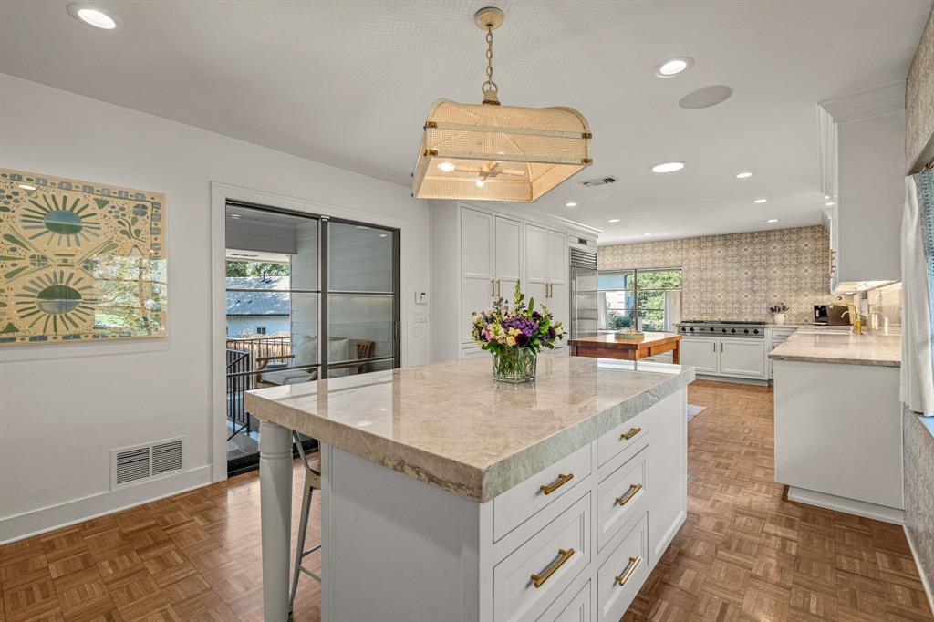 5849 Merrymount Road Westover Hills, TX 76107 - Photo 18 of 40 a kitchen with stainless steel appliances granite countertop stove a sink and a refrigerator