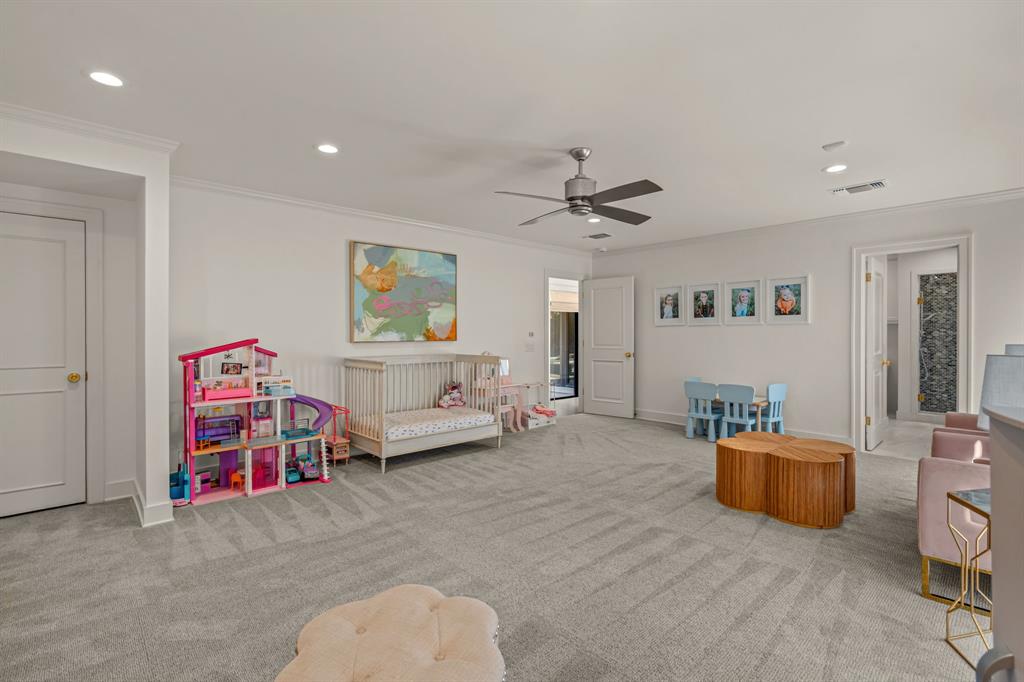 5849 Merrymount Road Westover Hills, TX 76107 - Photo 25 of 40 a living room with furniture and a chandelier
