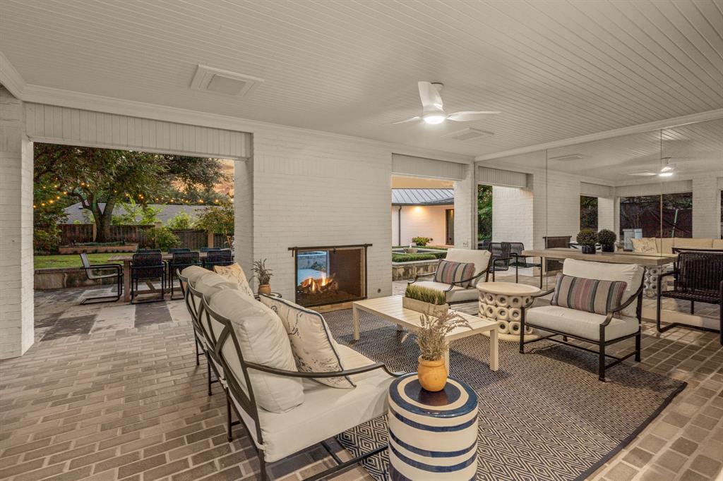 5849 Merrymount Road Westover Hills, TX 76107 - Photo 26 of 32 a living room with furniture and a fireplace