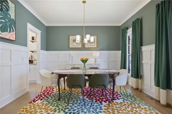 a view of a dining room with furniture