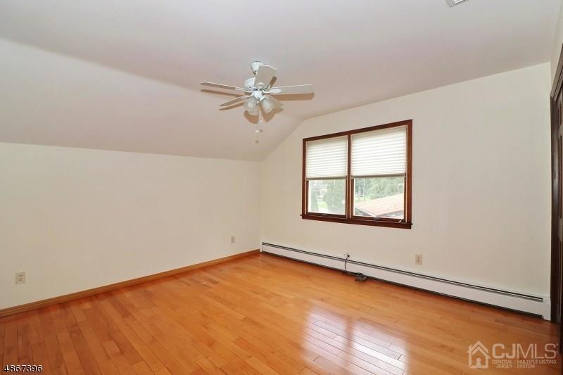 5 Sleepy Hollow Road Edison, NJ 08820 - Photo 18 of 24 an empty room with a window