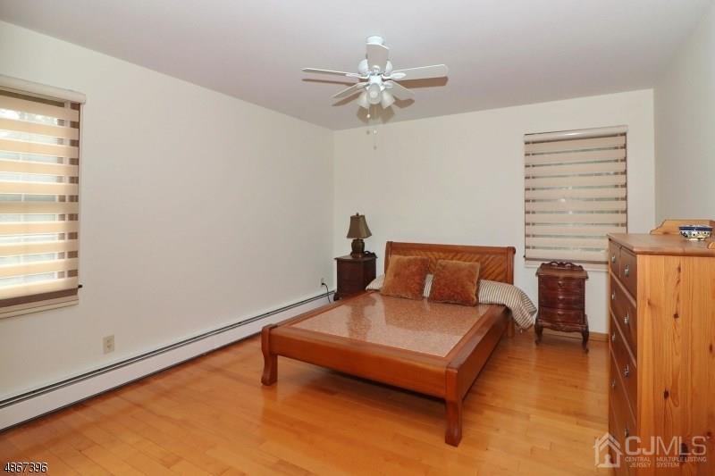5 Sleepy Hollow Road Edison, NJ 08820 - Photo 19 of 24 a living room with furniture and a window