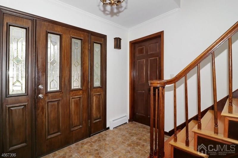 5 Sleepy Hollow Road Edison, NJ 08820 - Photo 3 of 24 a view of an entryway with staircase