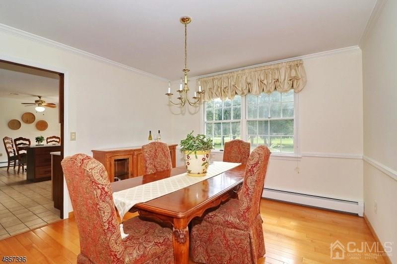 5 Sleepy Hollow Road Edison, NJ 08820 - Photo 7 of 24 a dining room with furniture and window