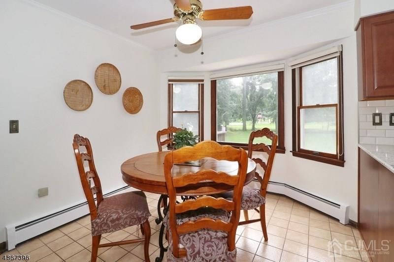 5 Sleepy Hollow Road Edison, NJ 08820 - Photo 10 of 24 a dining room with furniture and window