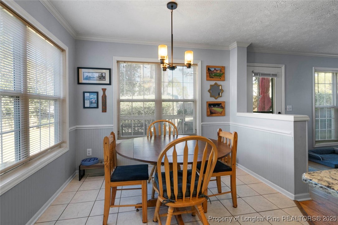 59 Prestige Drive Cameron, NC 28326 - Photo 13 of 36 a dining room with furniture and window