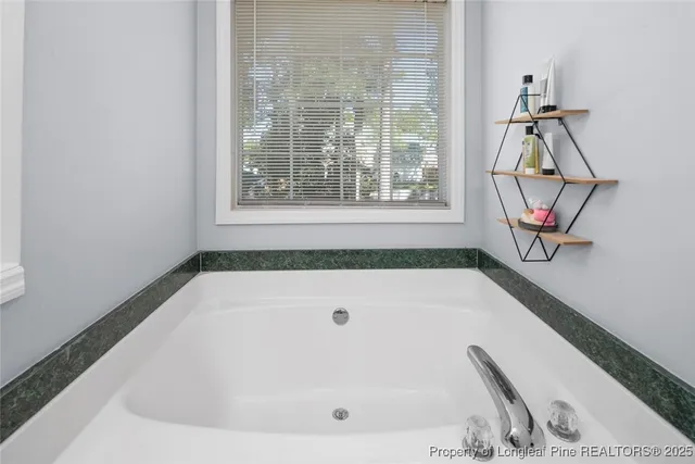 a bathroom with a bathtub