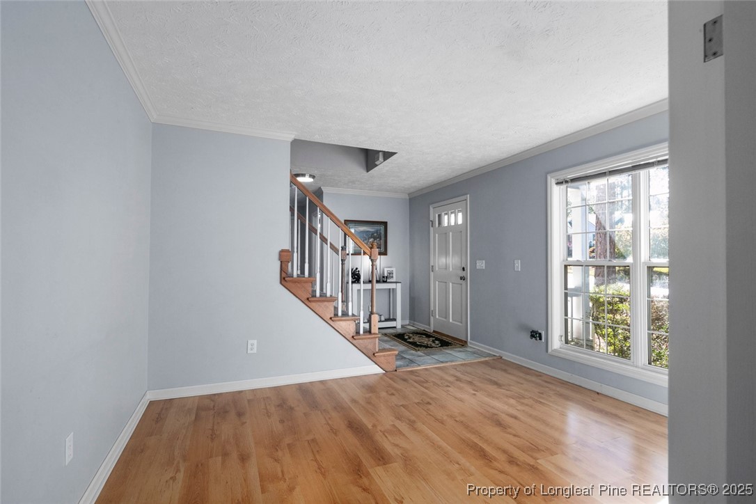59 Prestige Drive Cameron, NC 28326 - Photo 5 of 36 a view of entryway with wooden floor and stairs