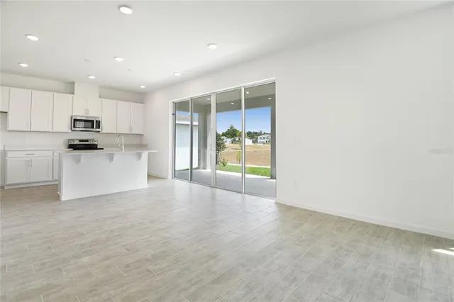 a view of a kitchen with a sink
