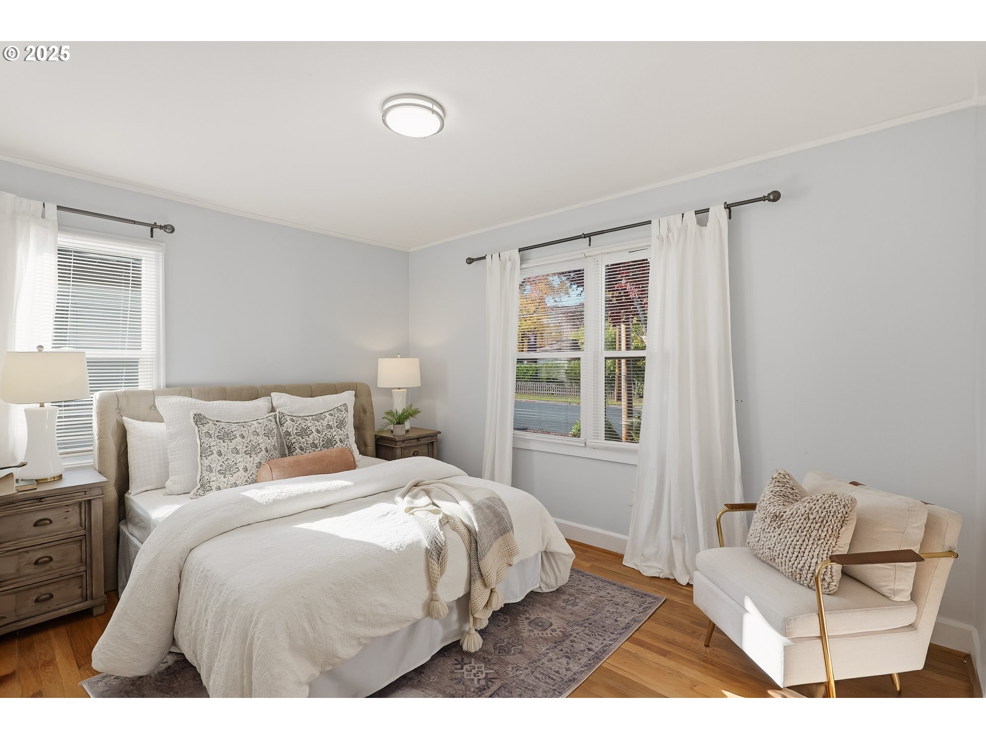 1813 Filbert Street Forest Grove, OR 97116 - Photo 11 of 23 a bedroom with a bed and a window