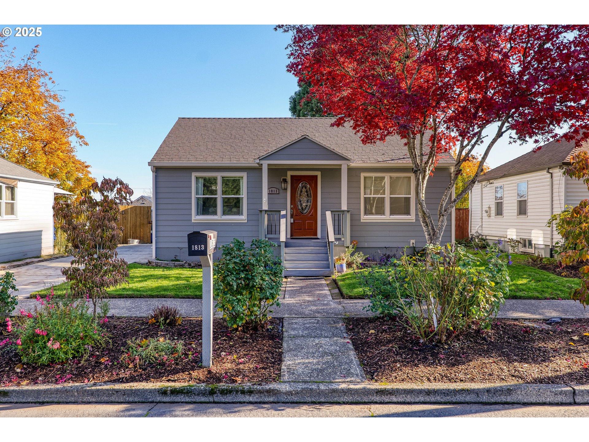1813 Filbert Street Forest Grove, OR 97116 - Photo 22 of 23 a front view of a house with garden