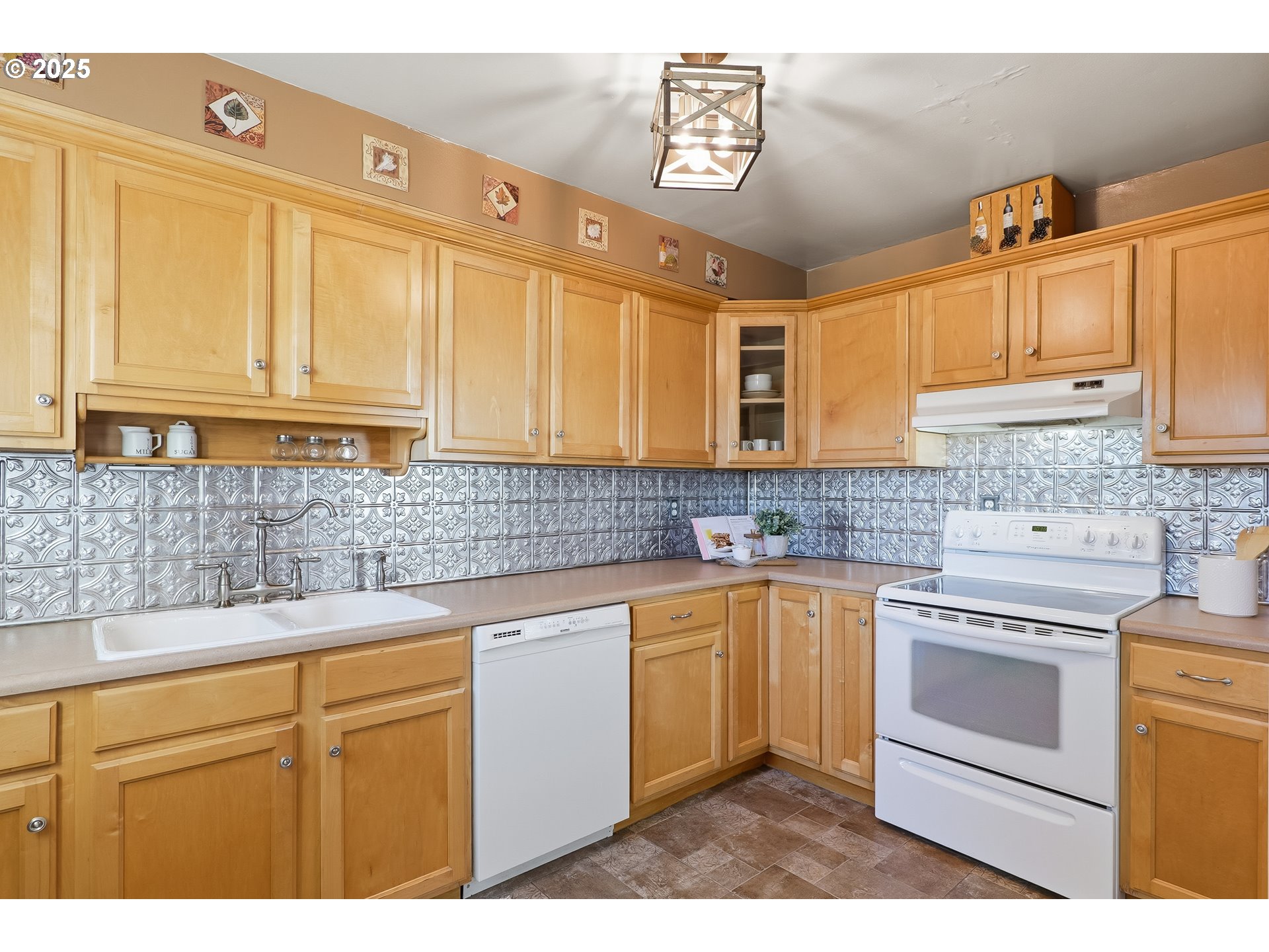 1813 Filbert Street Forest Grove, OR 97116 - Photo 9 of 23 a kitchen with stainless steel appliances granite countertop a sink and cabinets