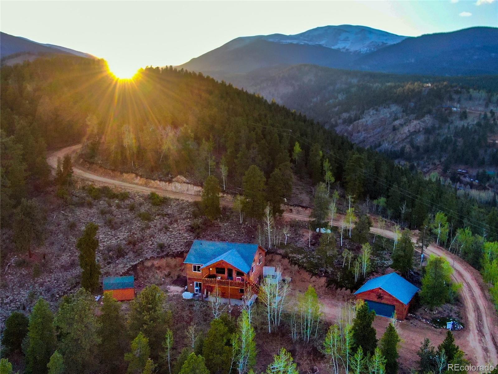 7120 County Road 43 Bailey, CO 80421 - Photo 2 of 37 a view of a house with a street