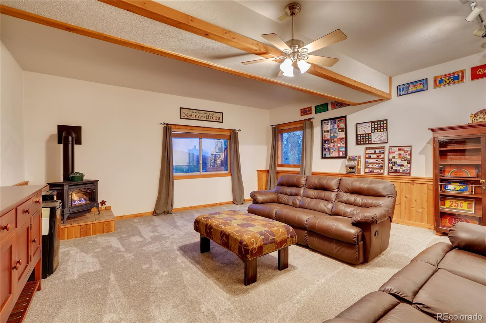 7120 County Road 43 Bailey, CO 80421 - Photo 28 of 37 a living room with furniture and a flat screen tv