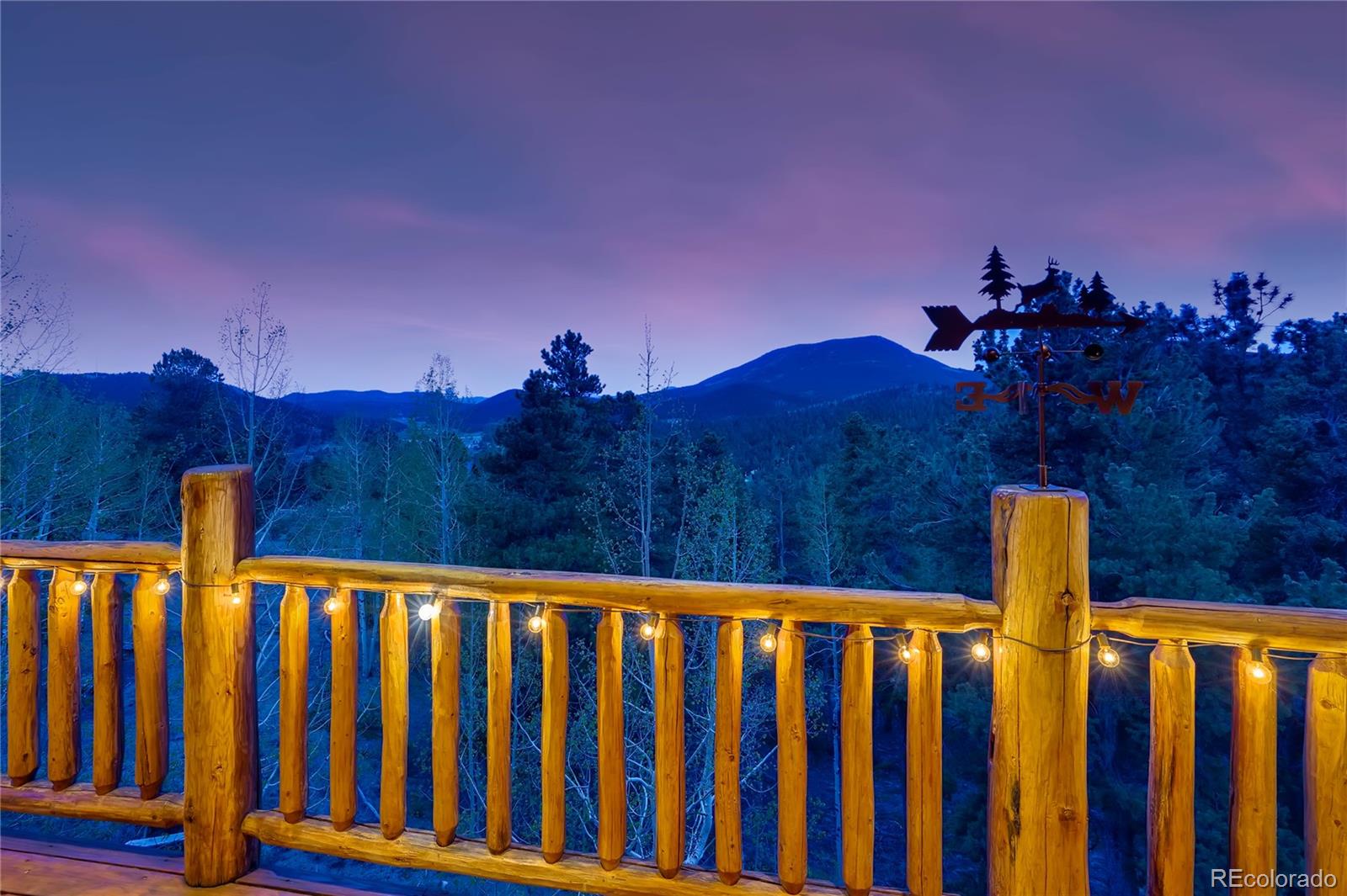 7120 County Road 43 Bailey, CO 80421 - Photo 9 of 37 a view of a brick wall and a wooden fence