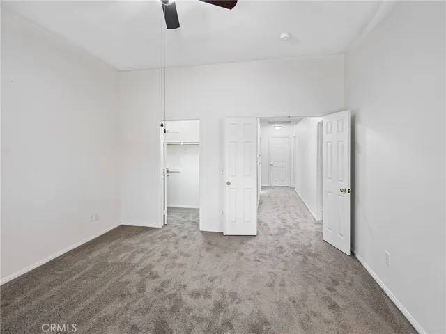 a view of an empty walk in closet