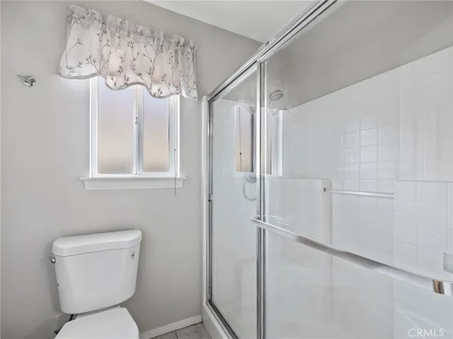 a view of a house next to a yard