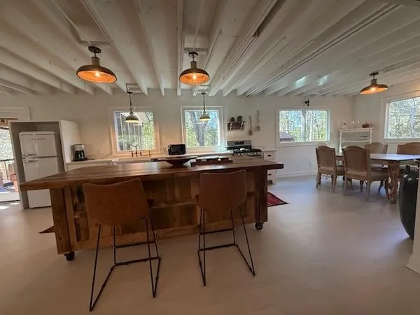 a view of a dining room with furniture