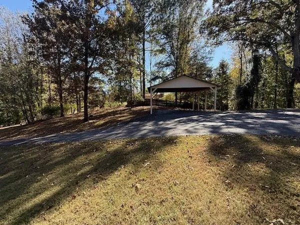a view of a yard with an outdoor space