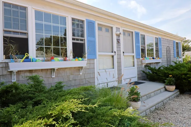 front view of house with a garden