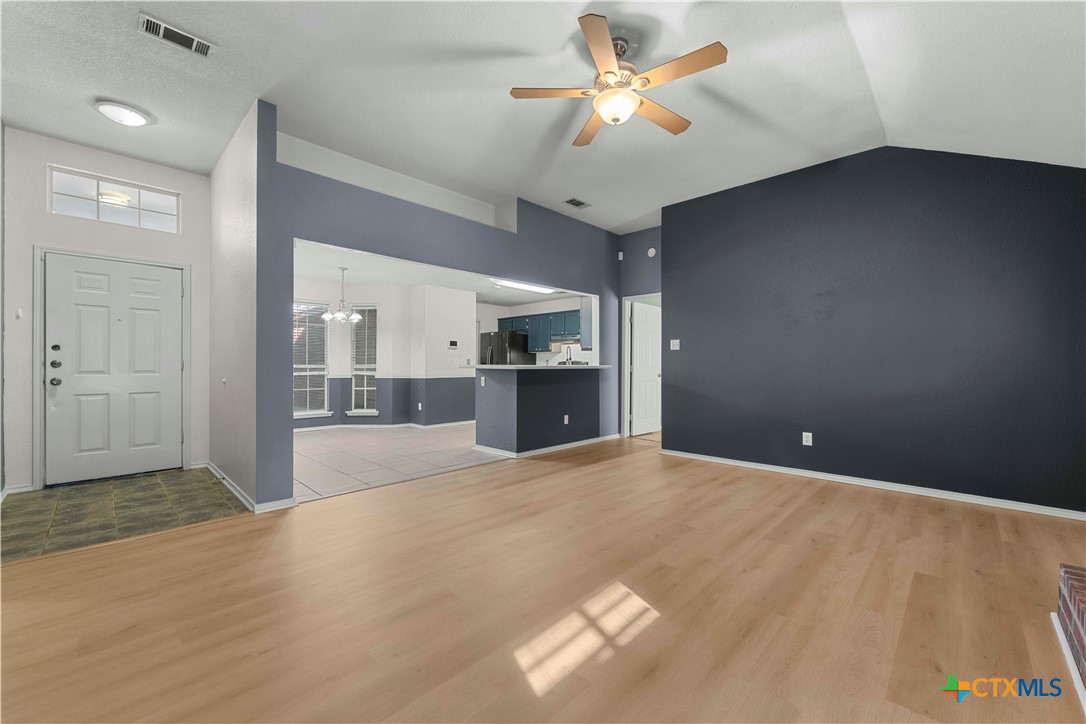 3624 Rainforest Lane Killeen, TX 76549 - Photo 11 of 27 a view of an empty room with a kitchen
