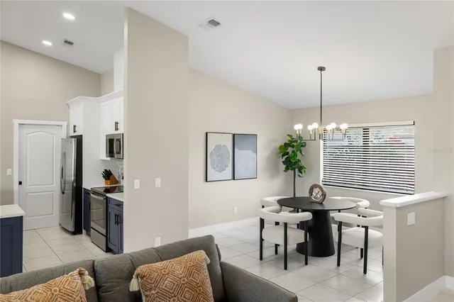 a view of a livingroom with furniture and window
