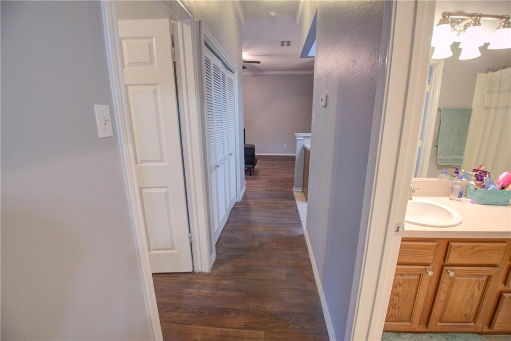 2606 Rio Grande Street, Unit 101 Austin, TX 78705 - Photo 12 of 24 a view of a bathroom from a hallway