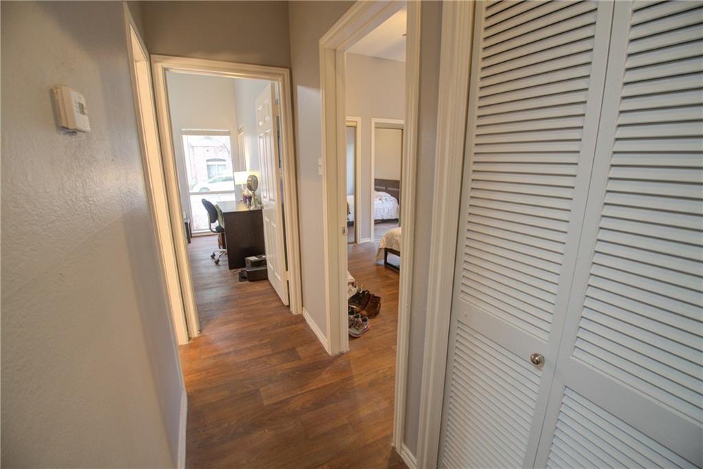 2606 Rio Grande Street, Unit 101 Austin, TX 78705 - Photo 13 of 24 a view of a bathroom from a hallway