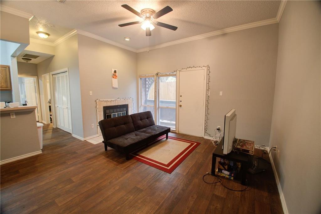 2606 Rio Grande Street, Unit 101 Austin, TX 78705 - Photo 2 of 24 a living room with furniture and a wooden floor