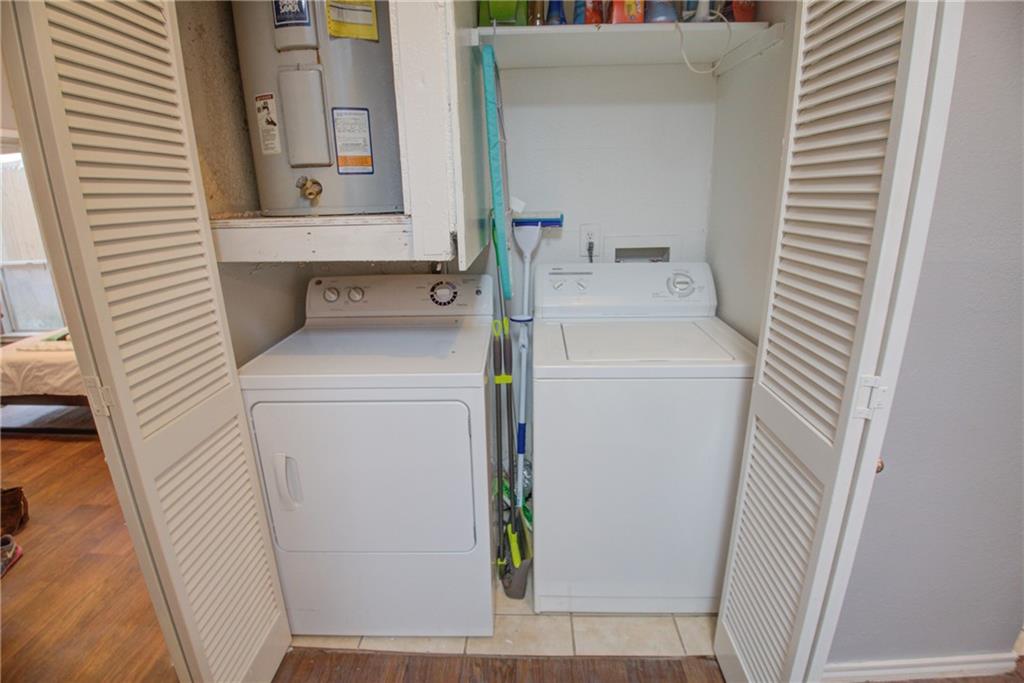 2606 Rio Grande Street, Unit 101 Austin, TX 78705 - Photo 5 of 24 a utility room with dryer and washer