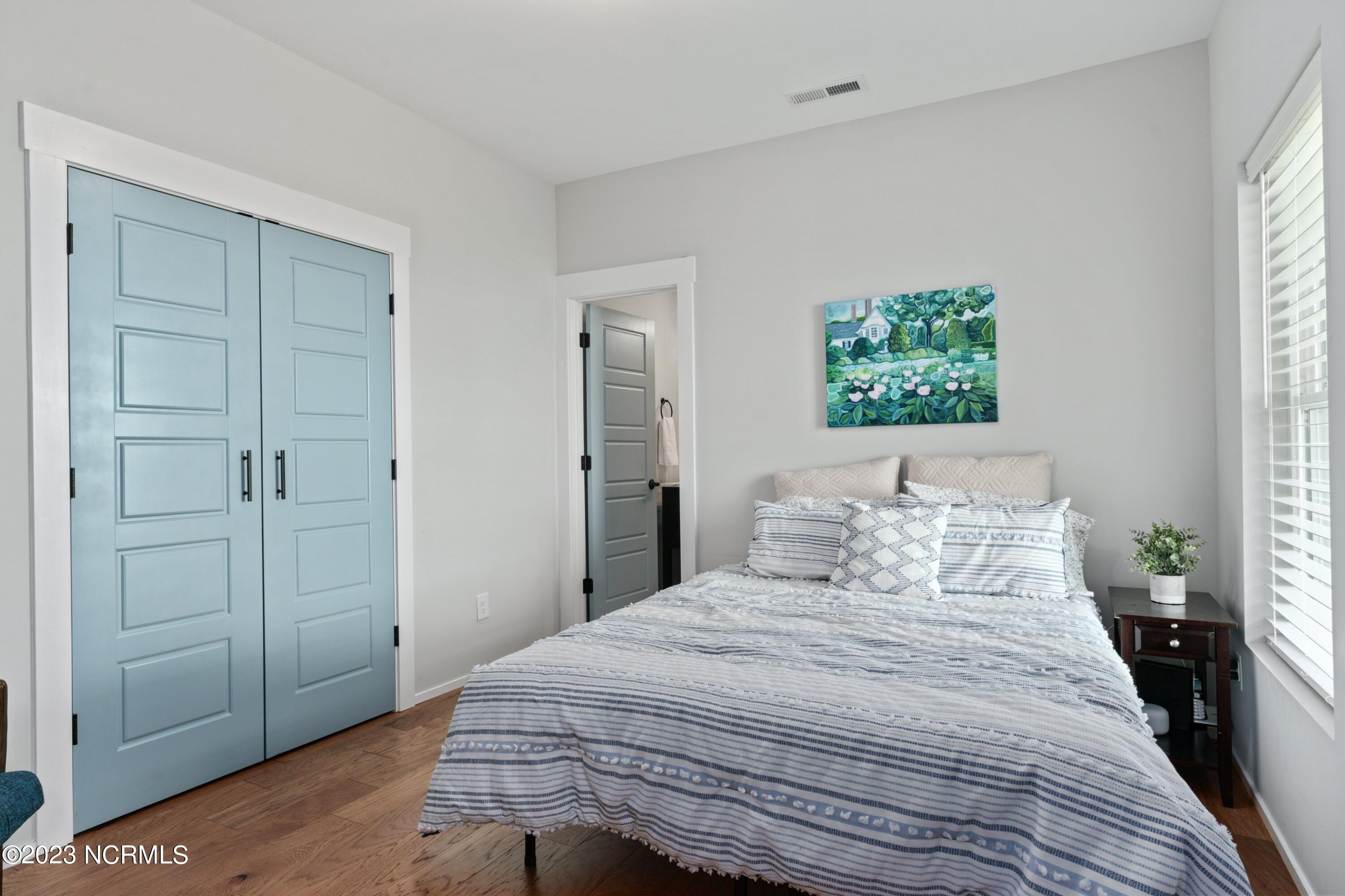 158 Brookhaven Trail Leland, NC 28451 - Photo 25 of 74 Bedroom #2; downstairs guest room with en suite bathroom.